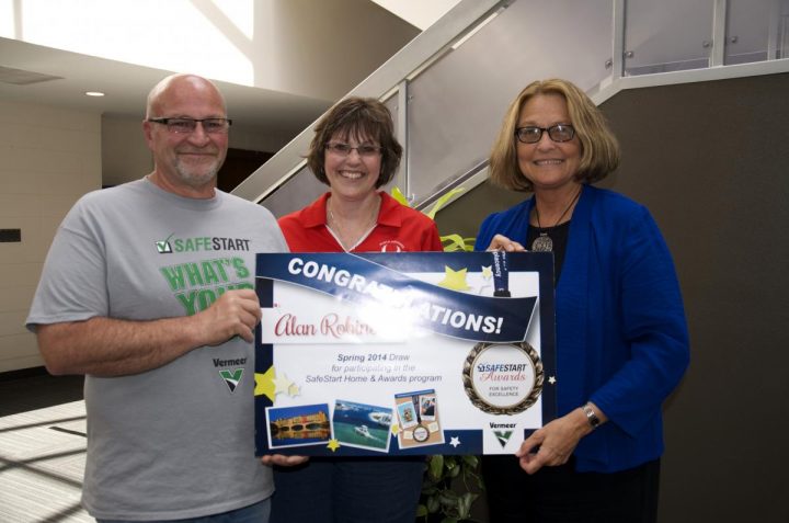 Grand Prize winner Alan Robinson (left) is pictured here with his wife Helena (center), and Vermeer Corporation President and CEO Mary Andringa