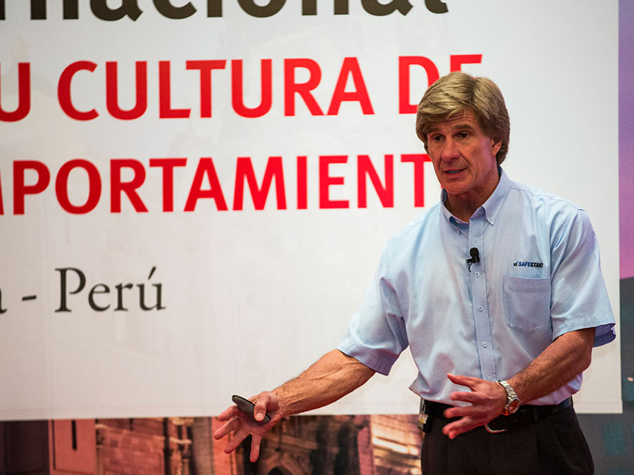 Larry Wilson speaks at a DuPont forum in Lima, Peru