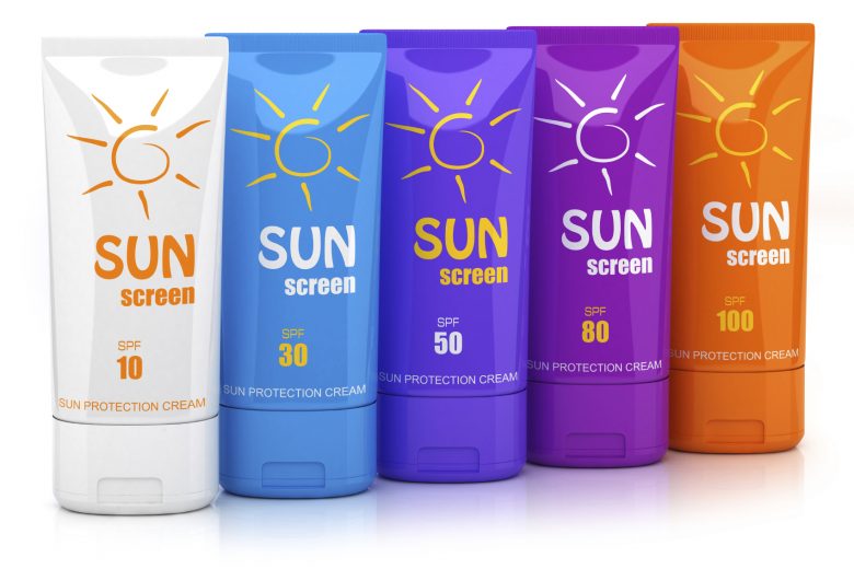 Five colored tubes of sun screen, displayed in ascending order of SPF number