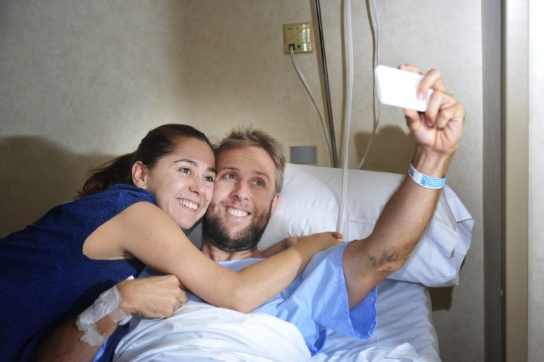 Taking a selfie in a hospital bed