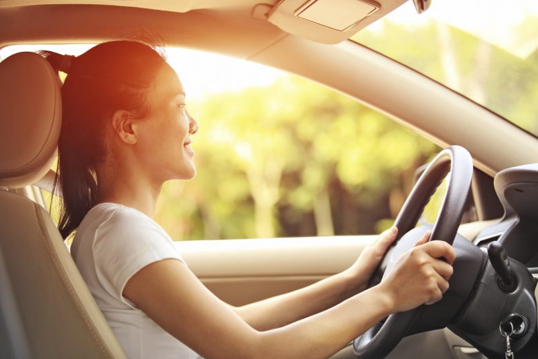 Girl driving in an ergonomically correct position