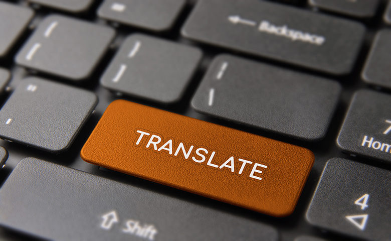 Translation service concept on laptop keyboard
