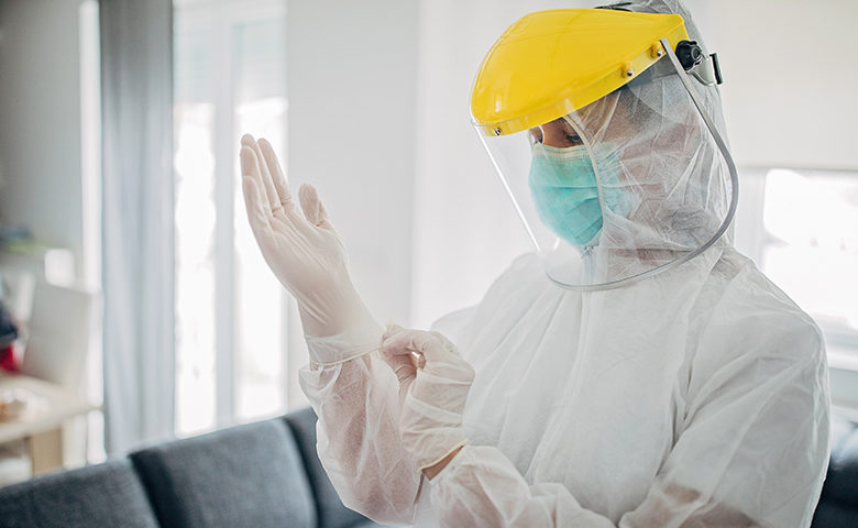 Medical worker in full protective suit