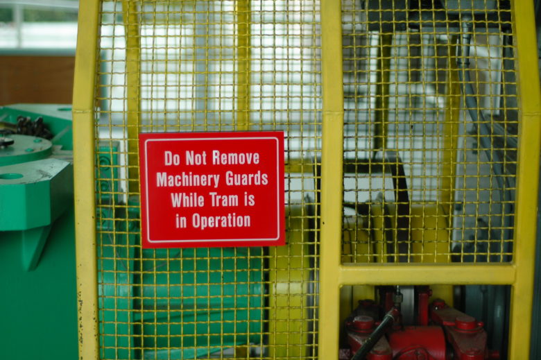 Machine guarding warning sign