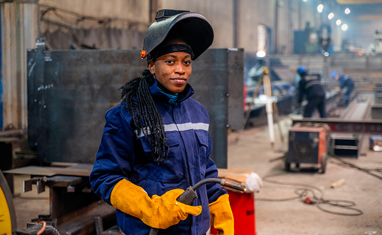 Young Woman Welding