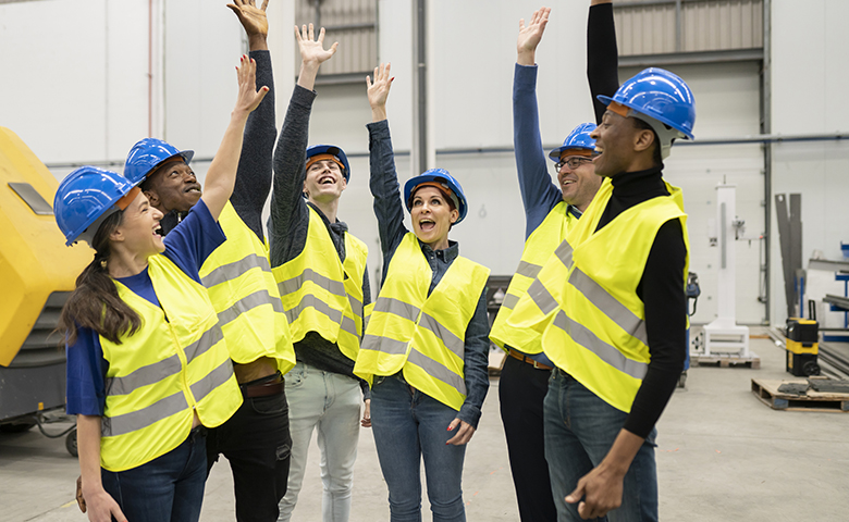 Group of workers happy and celebrating at work