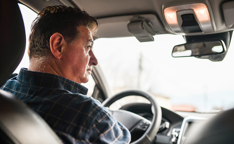 Man distracted cognitively while driving car