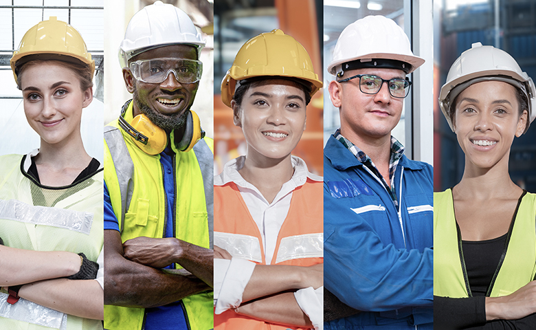 Group of young workers standing confident in work place.