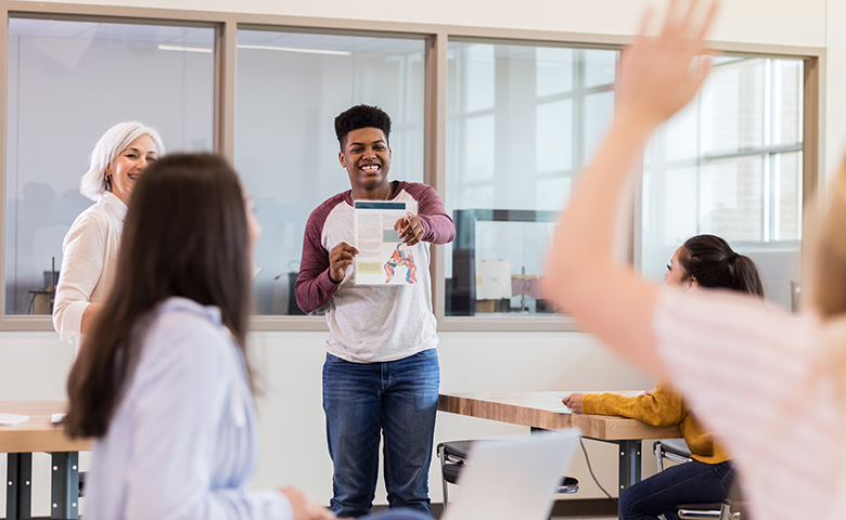 Young man adds humor to presentation