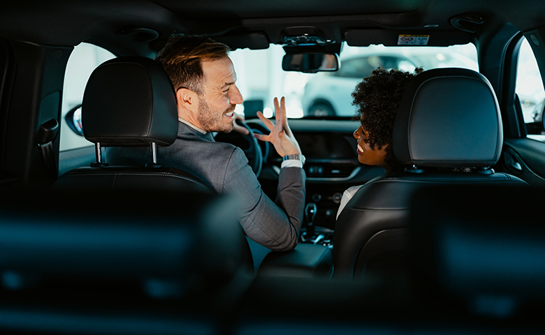 Driver complacent to driving risks talking to passenger
