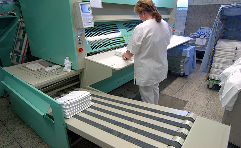 Woman working at a mangle